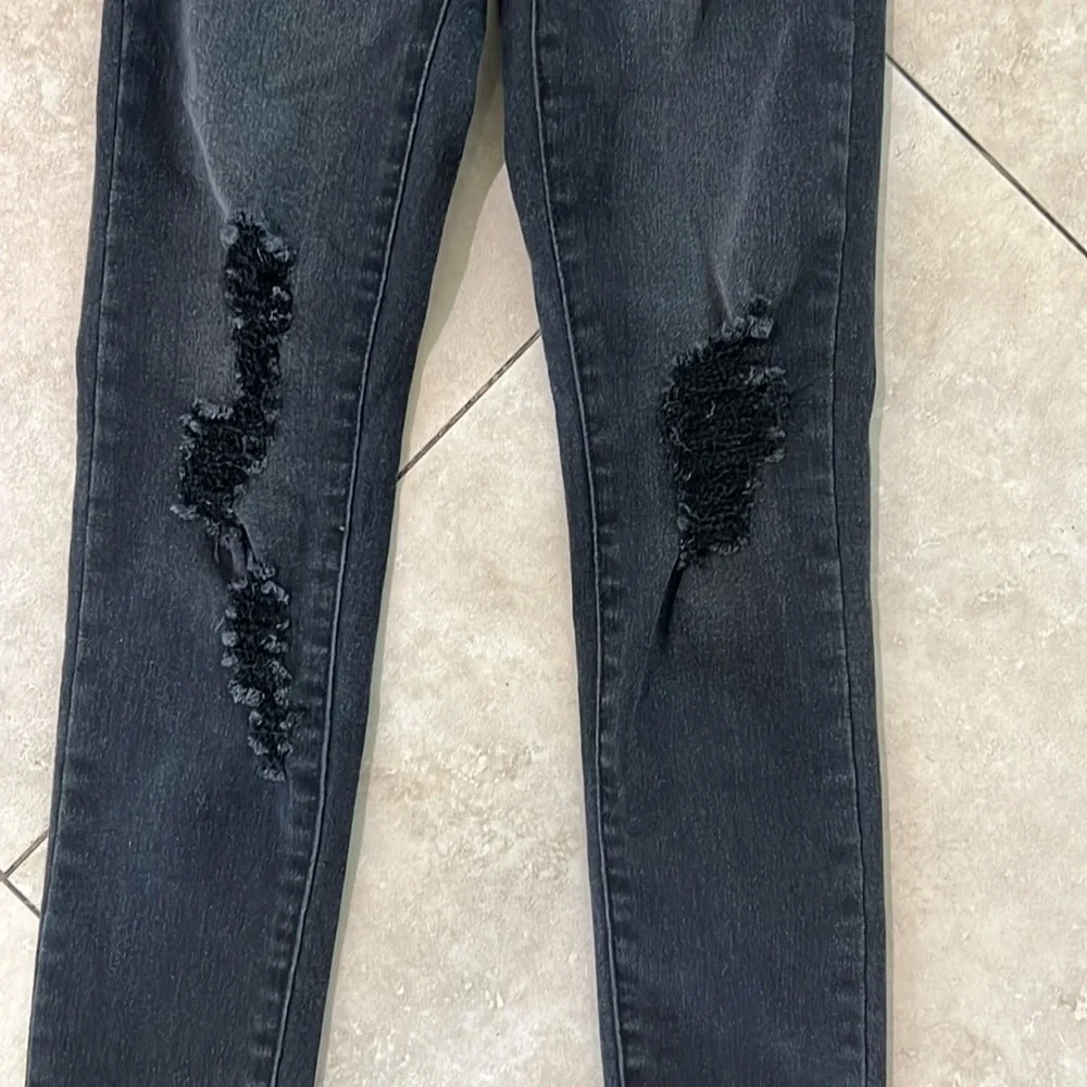 Levi’s High Rise Super Skinny Distressed Jeans Size 8